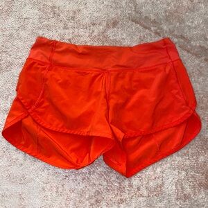 Red / orange Lululemon shorts size 4
